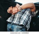 policeman-arrests-car-thief-on-260nw-1144500824 बेनी माझखेतमा २० वर्ष अघि हत्या गरी फरार व्यक्ति पक्राउ